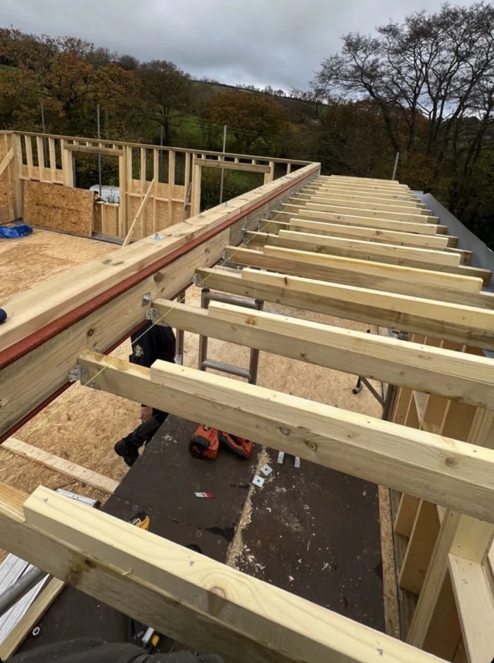 Timber roof joists installed during construction